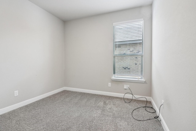 empty room featuring carpet