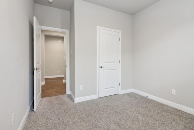 unfurnished bedroom featuring carpet