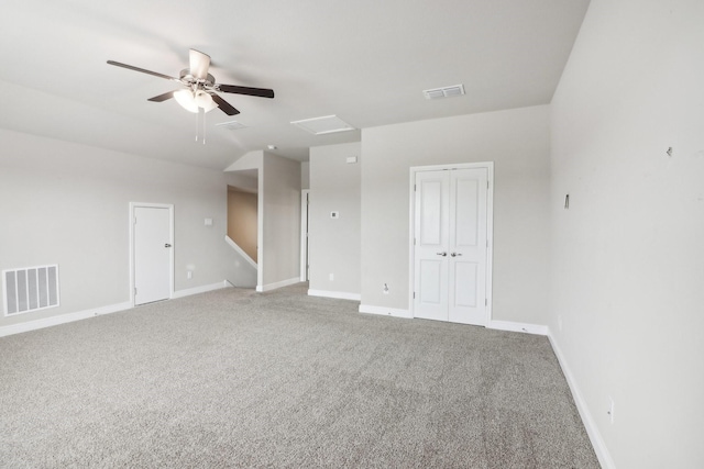 carpeted empty room with ceiling fan