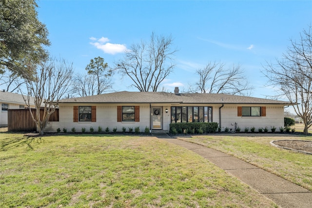 single story home with a front yard