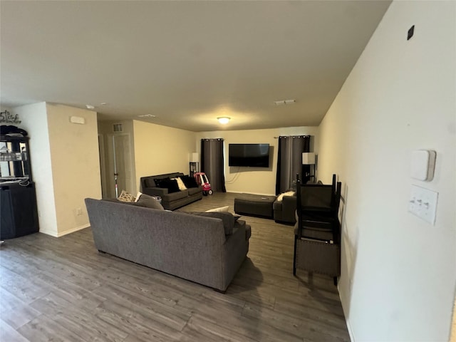 living room with hardwood / wood-style floors