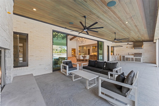 view of patio with area for grilling, ceiling fan, grilling area, and outdoor lounge area