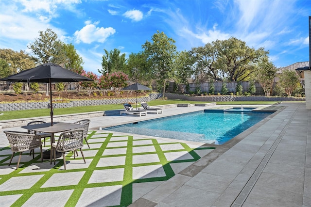 view of pool with a fenced in pool, a patio area, and fence