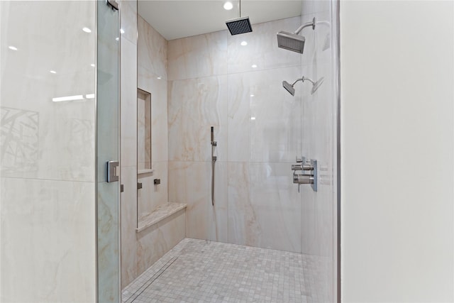 bathroom with a shower stall