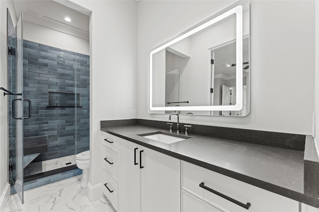 bathroom with toilet, recessed lighting, vanity, marble finish floor, and a shower stall