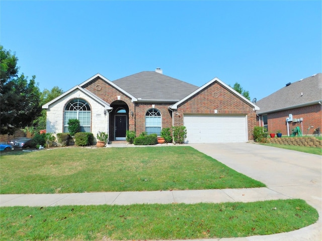 ranch-style home with a garage and a front yard