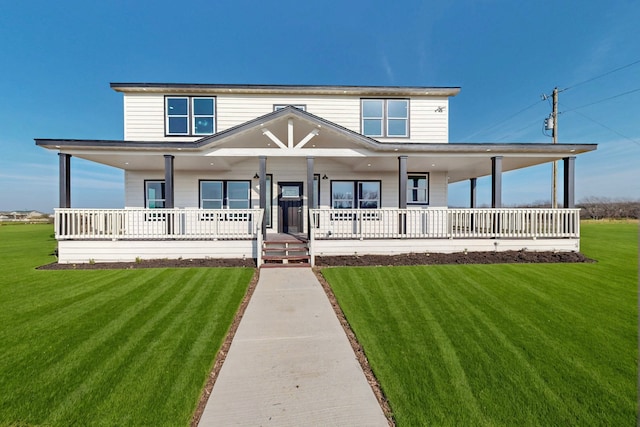 view of front facade featuring covered porch and a front yard