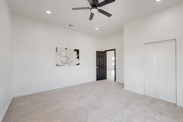 unfurnished bedroom featuring carpet floors, recessed lighting, baseboards, a ceiling fan, and visible vents