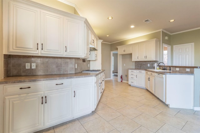 kitchen featuring white cabinetry, stainless steel gas stovetop, sink, white dishwasher, and crown molding