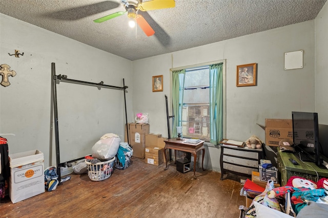 storage area featuring ceiling fan