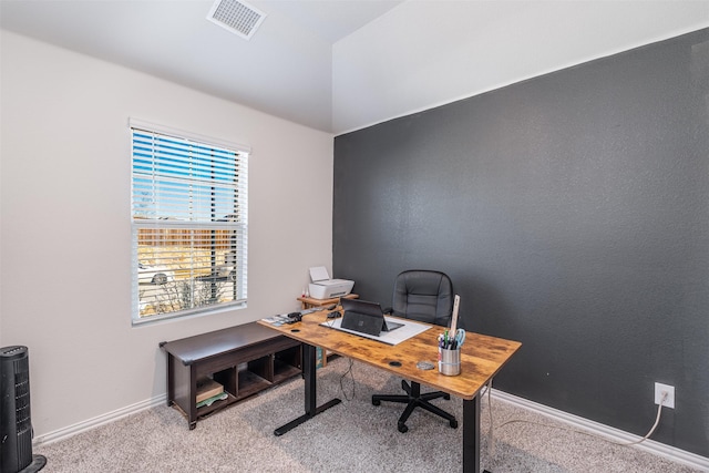 office space with carpet flooring, visible vents, and baseboards