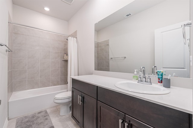 full bath featuring shower / tub combo with curtain, visible vents, toilet, vanity, and tile patterned flooring