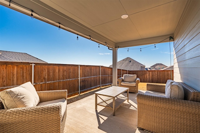 view of patio featuring a fenced backyard and outdoor lounge area