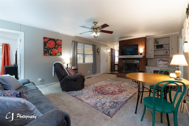 living room featuring a fireplace, light carpet, crown molding, and ceiling fan