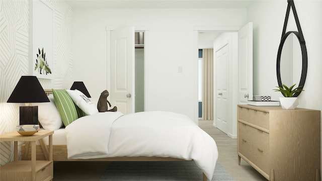 bedroom with wood-type flooring