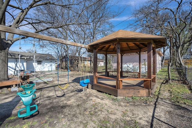 view of yard featuring a wooden deck and a gazebo