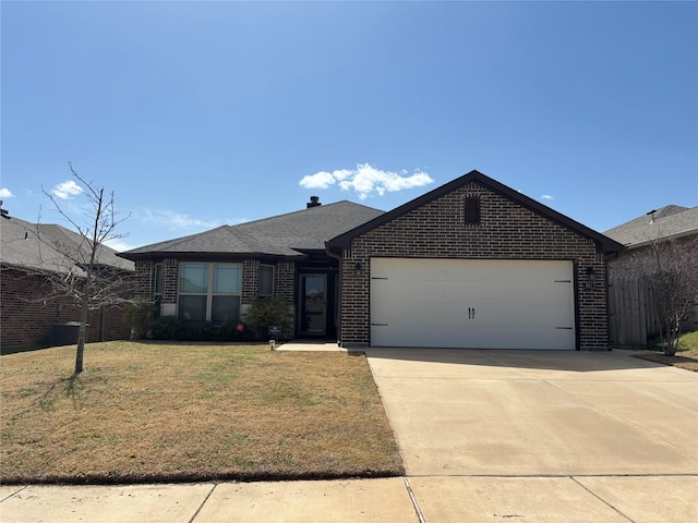 ranch-style home featuring roof with shingles, an attached garage, concrete driveway, a front lawn, and brick siding