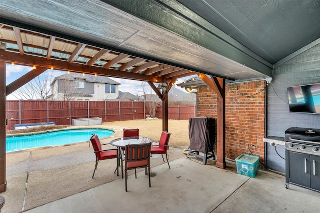 view of patio featuring a fenced in pool