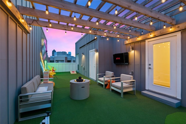 view of patio / terrace with an outdoor living space and a pergola