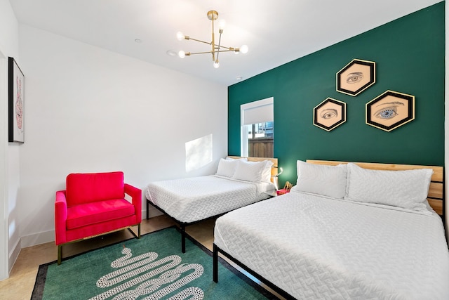 bedroom featuring an inviting chandelier