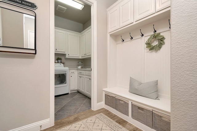 mudroom with washer / dryer and light hardwood / wood-style floors