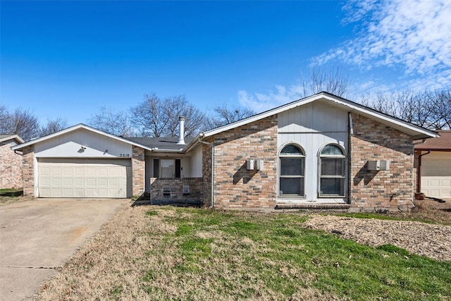 view of front of home with an attached garage, brick siding, concrete driveway, and a front yard