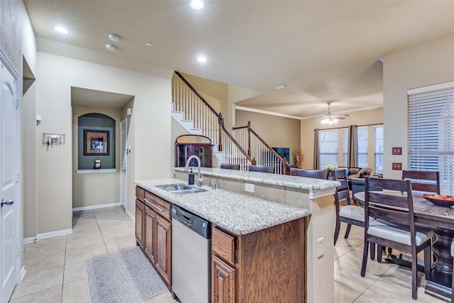 5320 Locust Dr, Mckinney, TX 75070 - kitchen with dishwasher, a sink, a kitchen island with sink, a ceiling fan, and open floor plan