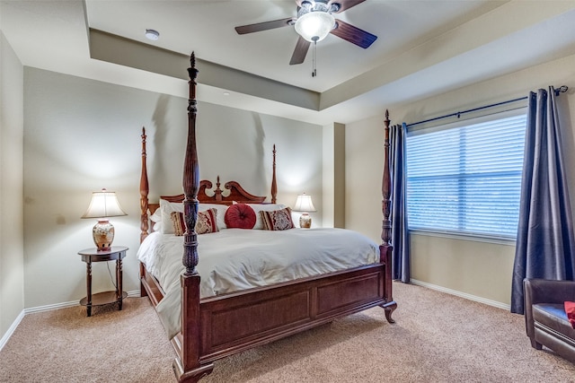 5320 Locust Dr, Mckinney, TX 75070 - bedroom featuring light colored carpet, baseboards, and a tray ceiling
