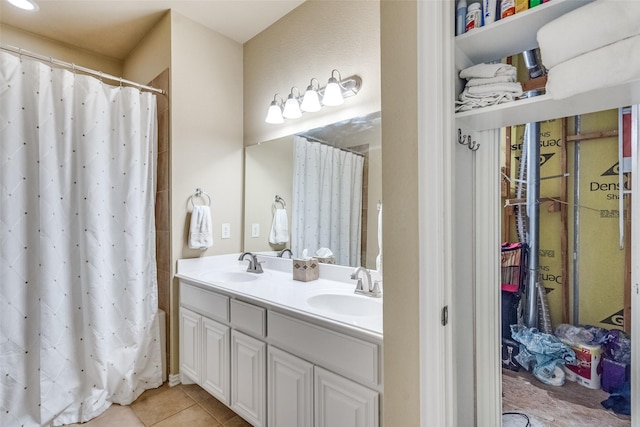 5320 Locust Dr, Mckinney, TX 75070 - full bath with tile patterned floors, double vanity, and a shower with shower curtain