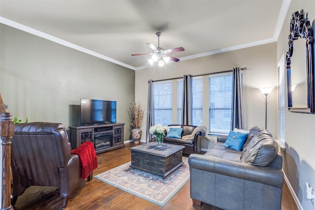 living room with ceiling fan, crown molding, and dark wood-type flooring