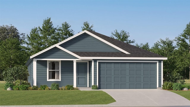 view of front of property featuring a garage and a front lawn