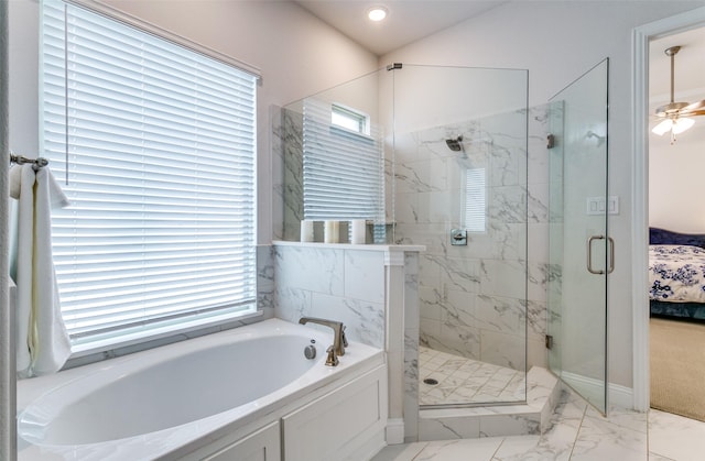 bathroom with separate shower and tub