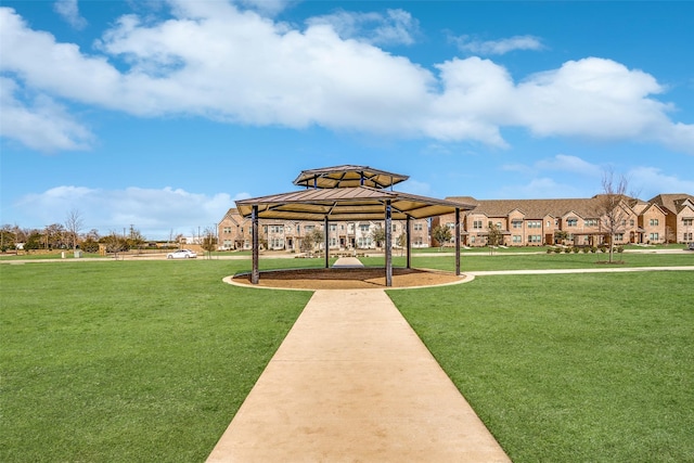 view of home's community featuring a lawn and a gazebo