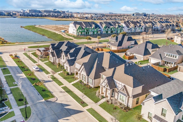 drone / aerial view featuring a water view