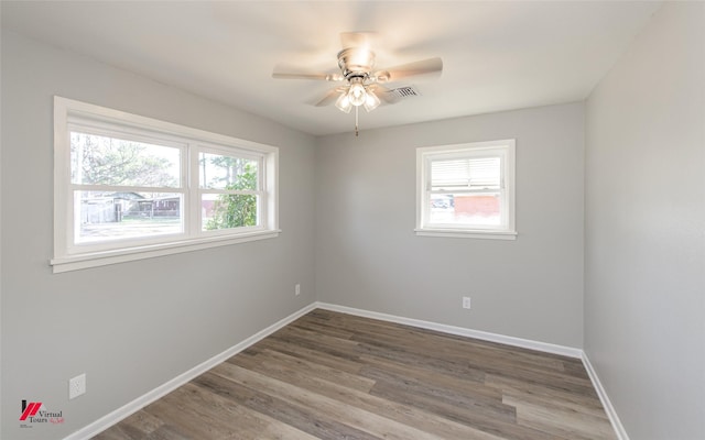 unfurnished room featuring hardwood / wood-style flooring and ceiling fan