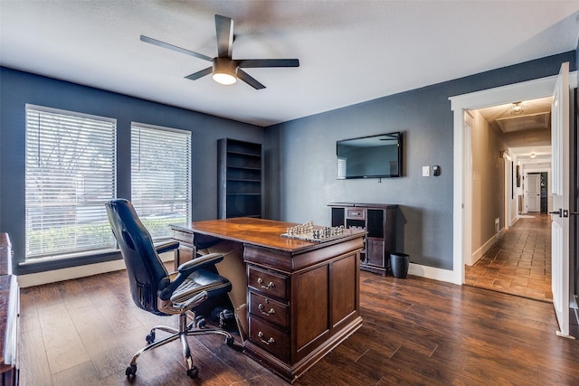 2248 Dorrington Dr, Dallas, TX 75228 - home office with a ceiling fan, baseboards, and dark wood finished floors
