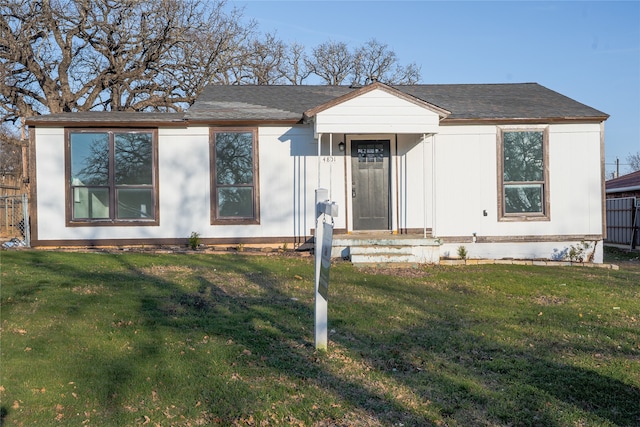 view of front of home with a front lawn