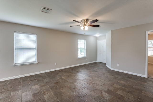 spare room featuring ceiling fan