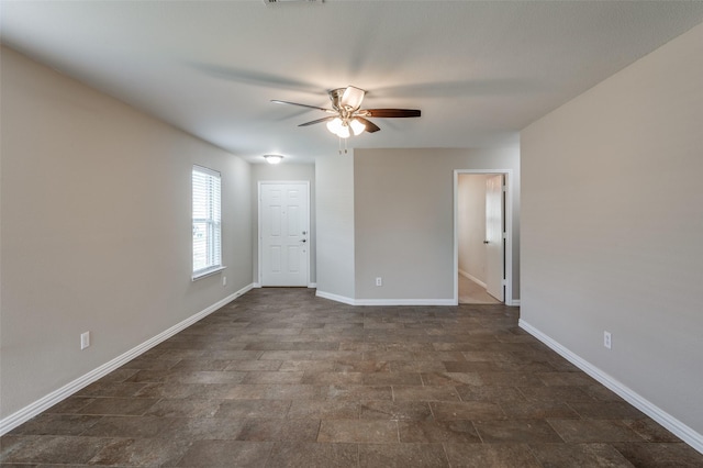 unfurnished room featuring ceiling fan