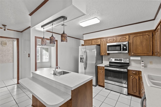 5570 Bretwood Dr, Keithville, LA 71047 - kitchen featuring appliances with stainless steel finishes, decorative light fixtures, crown molding, a kitchen island, and sink