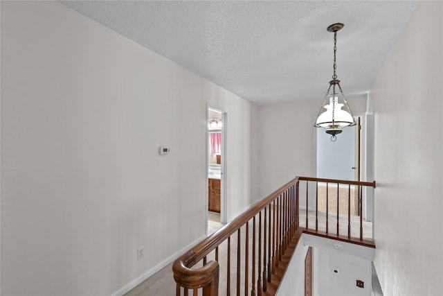 5570 Bretwood Dr, Keithville, LA 71047 - hall featuring a textured ceiling