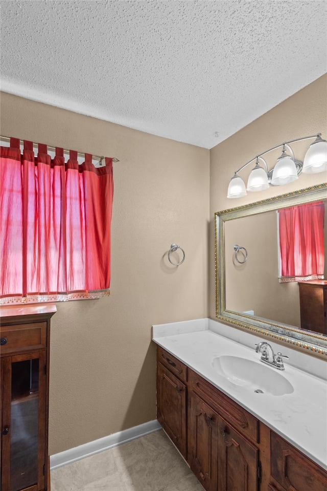 5570 Bretwood Dr, Keithville, LA 71047 - bathroom with vanity and a textured ceiling