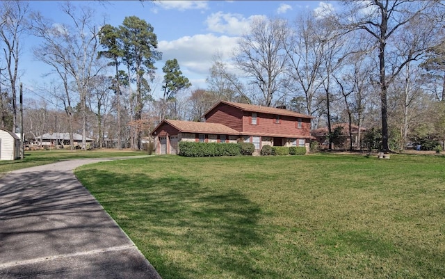 view of home's exterior with a yard