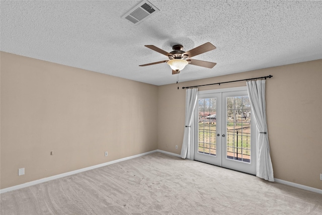 5570 Bretwood Dr, Keithville, LA 71047 - carpeted spare room with french doors, ceiling fan, and a textured ceiling