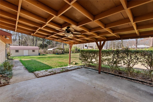 5570 Bretwood Dr, Keithville, LA 71047 - view of patio featuring an outbuilding and ceiling fan