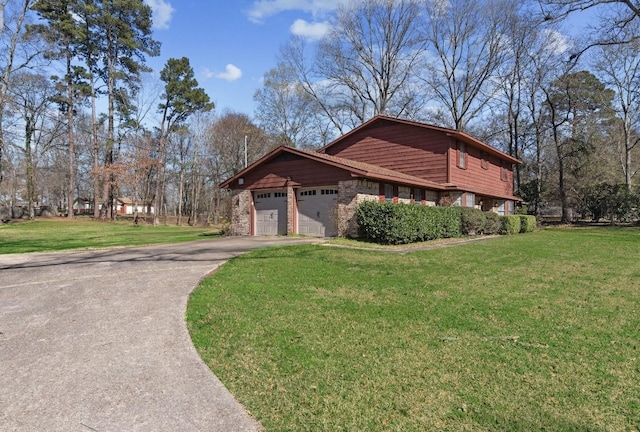 5570 Bretwood Dr, Keithville, LA 71047 - view of front of house with a front yard and a garage