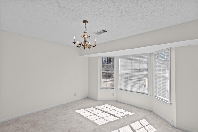 5570 Bretwood Dr, Keithville, LA 71047 - spare room with a textured ceiling, light carpet, and plenty of natural light