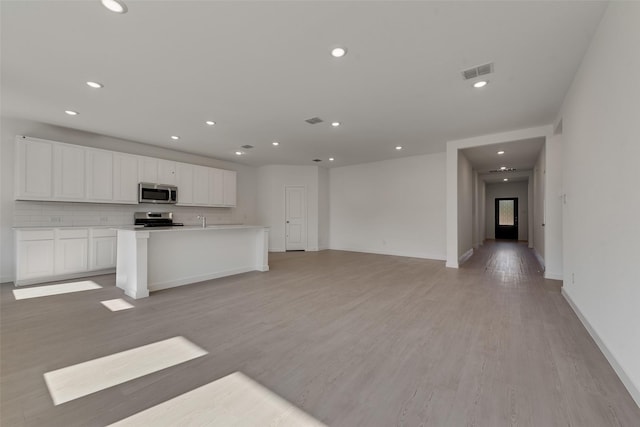 kitchen featuring appliances with stainless steel finishes, visible vents, and recessed lighting