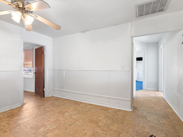 spare room featuring ceiling fan