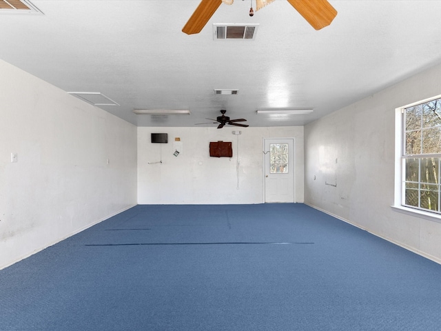 garage featuring ceiling fan